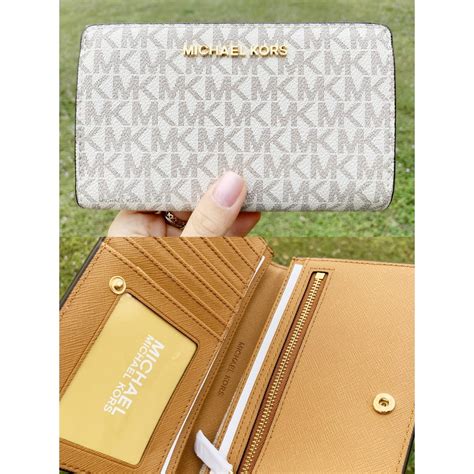 michael kors jet set billfold wallet|Michael Kors vanilla jet set.